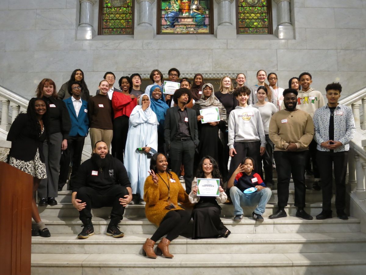 Youth Congress cohort gathered on the City Hall staircase